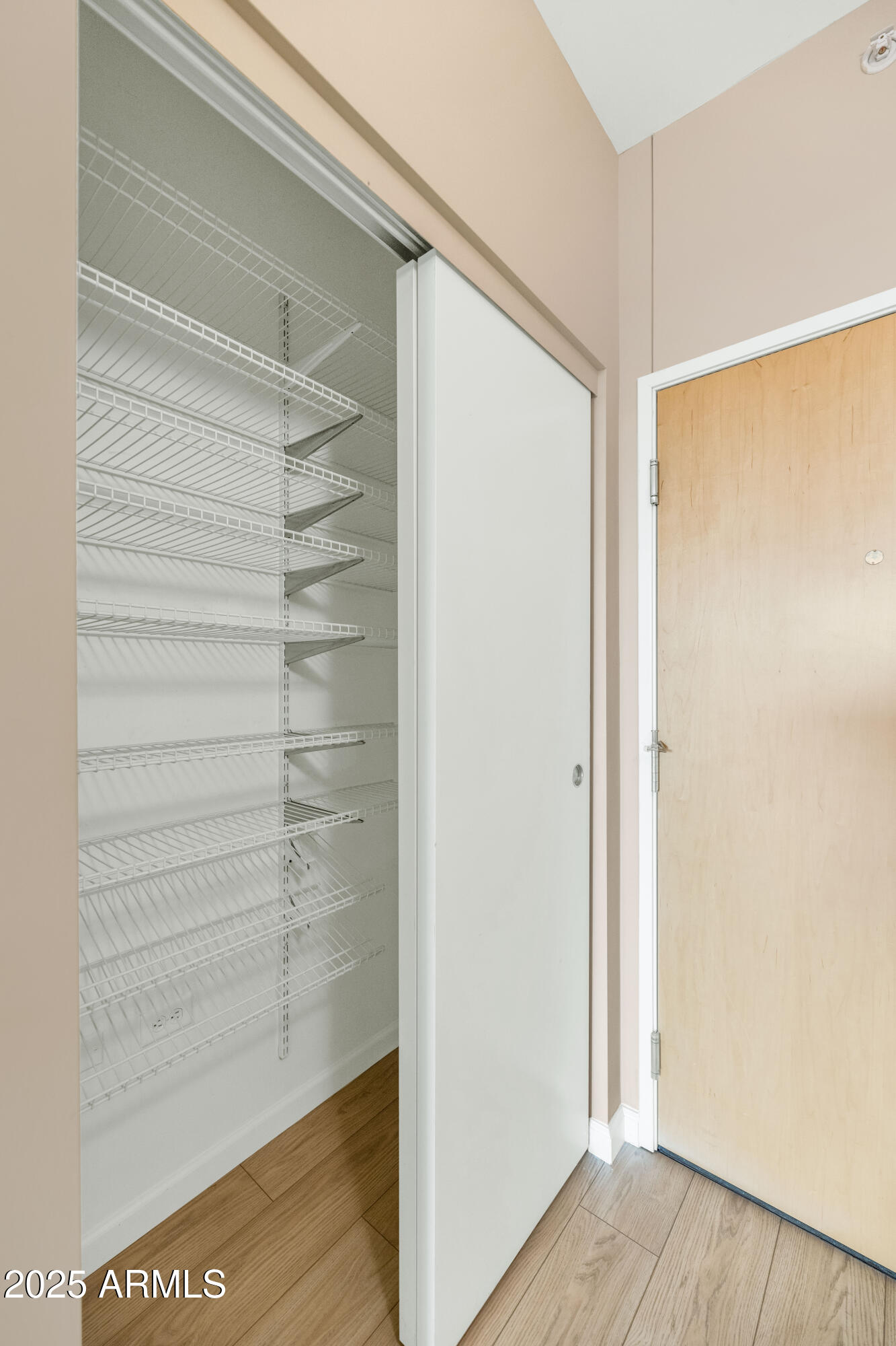 4808 North 24th Street, Unit 522 Phoenix, AZ 85016 - Photo 15 of 27 a view of walk in closet with empty racks