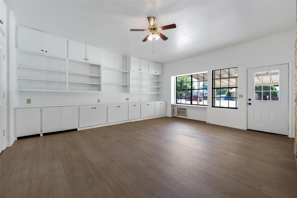 616 Laurel Road, Unit A Athens, TX 75751 - Photo 11 of 24 wooden floor in an empty room with a window