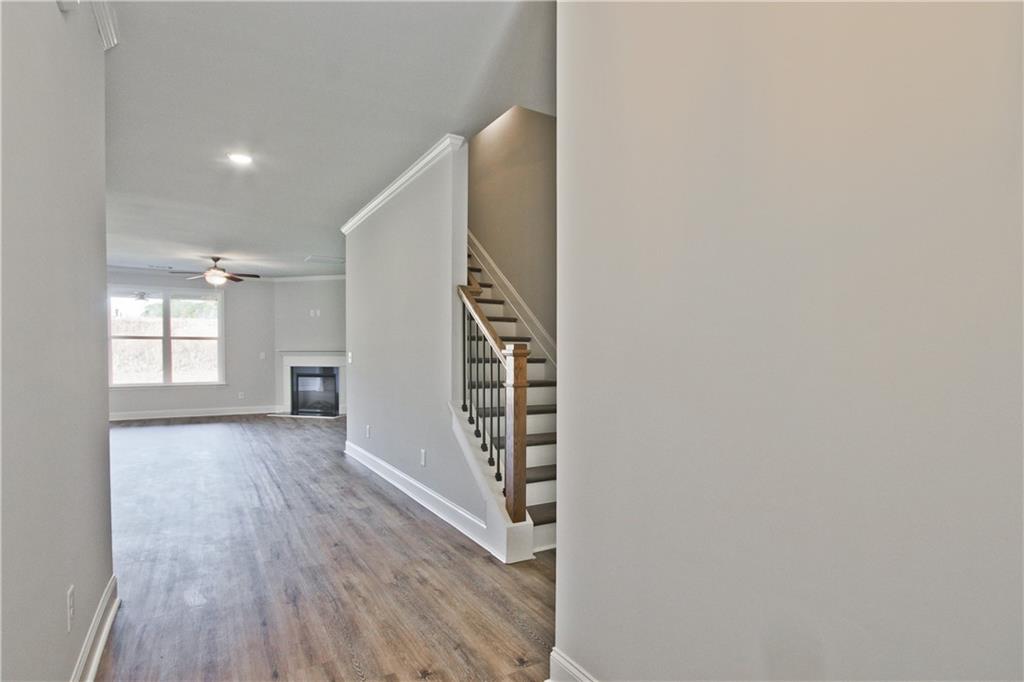 5984 Spring Way Lithonia, GA 30058 - Photo 2 of 37 a view of an entryway with wooden floor