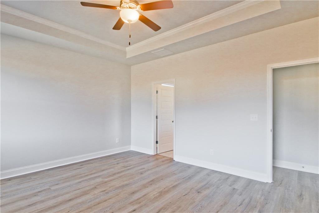 5984 Spring Way Lithonia, GA 30058 - Photo 21 of 37 wooden floor in an empty room