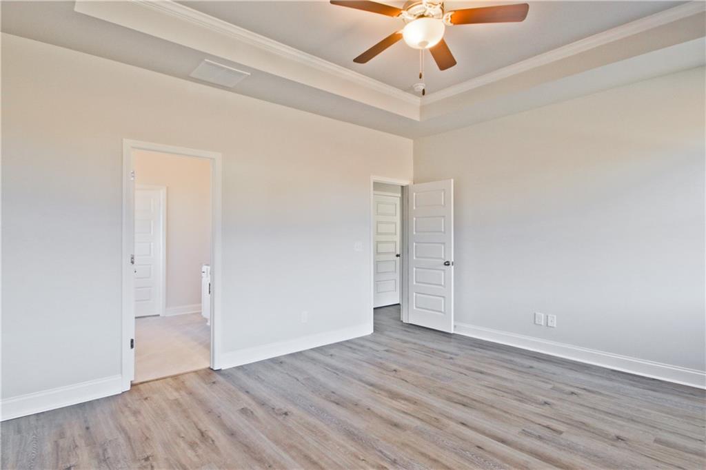 5984 Spring Way Lithonia, GA 30058 - Photo 22 of 37 wooden floor in an empty room