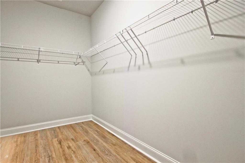 5984 Spring Way Lithonia, GA 30058 - Photo 27 of 37 a view of a room with racks on the wall