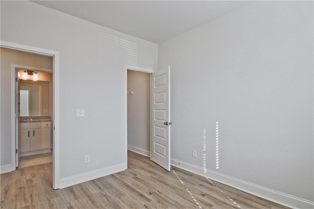 5984 Spring Way Lithonia, GA 30058 - Photo 29 of 37 wooden floor in an empty room