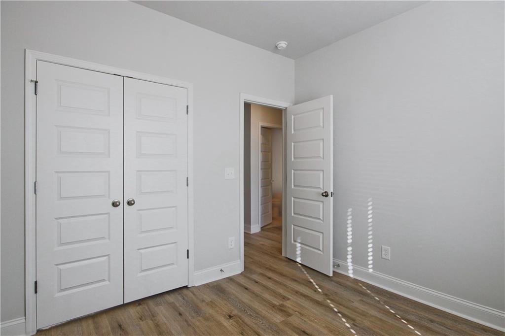 5984 Spring Way Lithonia, GA 30058 - Photo 31 of 37 an empty room with closet area