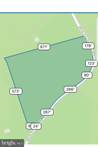 a view of a wall with a book shelf