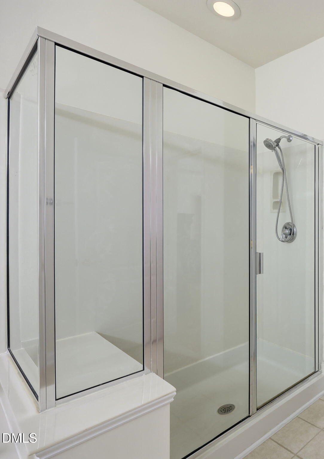 7712 Cloudview Lane Raleigh, NC 27613 - Photo 18 of 40 33-web-or-mls-IMG_4783 Primary Shower 11