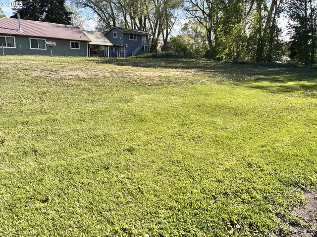 a view of a house with a swimming pool