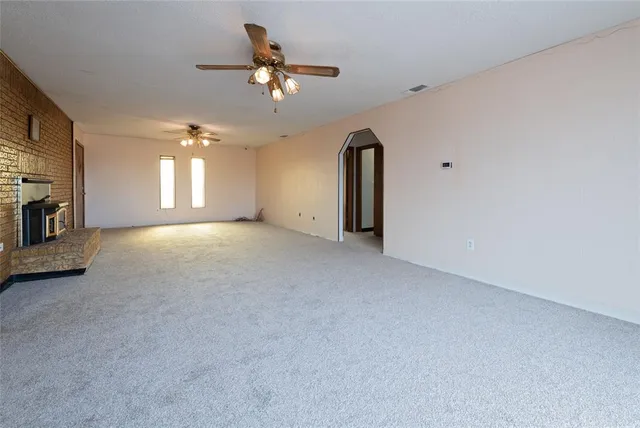 a view of a livingroom with a fireplace