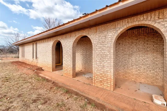 a front view of a house with parking