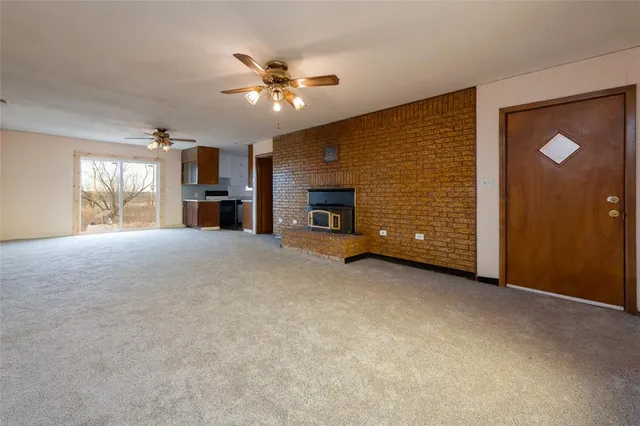 a view of a livingroom with a fireplace