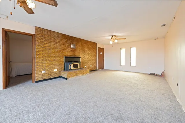 a view of a livingroom with a fireplace