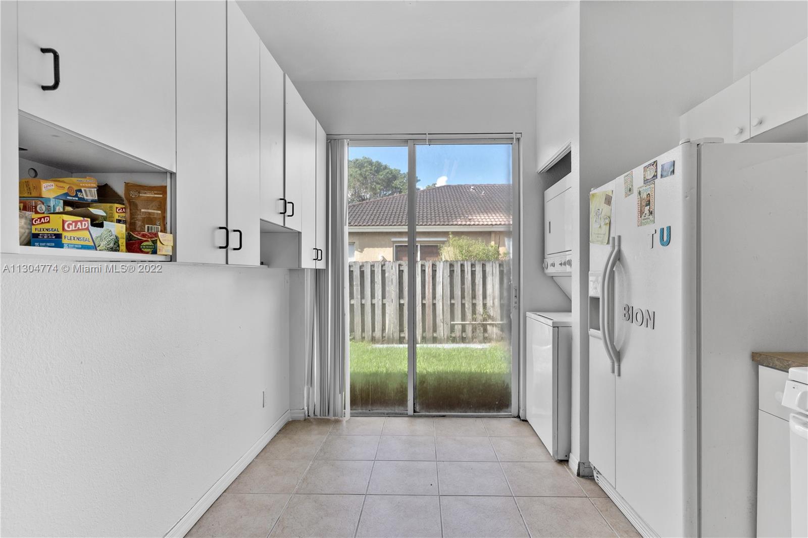 172 Southwest 15th Road Homestead, FL 33030 - Photo 8 of 23 a view of a hallway with a livingroom and a living room