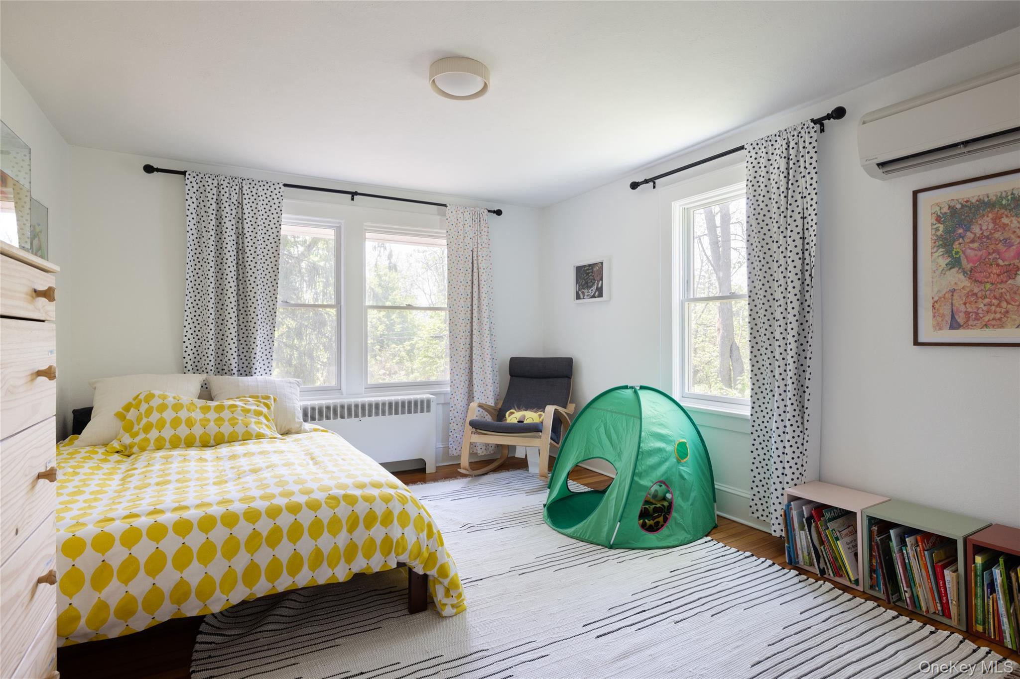 185 Verbank Village Road Millbrook, NY 12545 - Photo 19 of 22 a bedroom with a bed and a window
