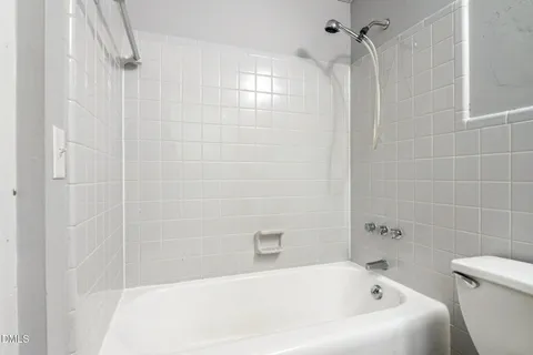 a view of a door and wooden floor