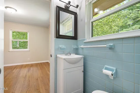 a view of a porch with a floor to ceiling window