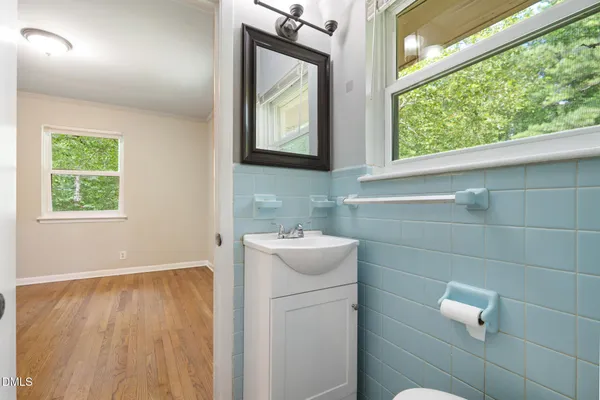 a view of a porch with a floor to ceiling window