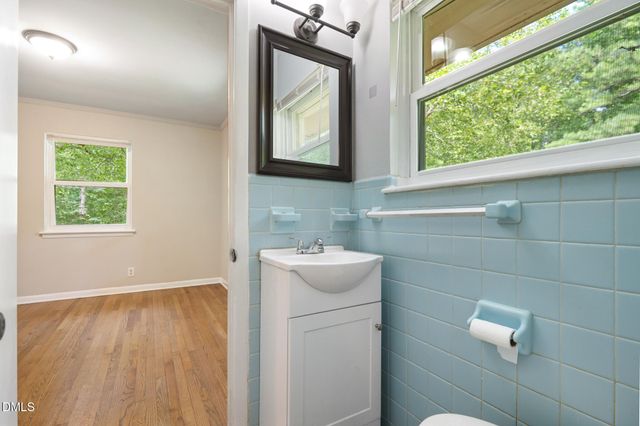 a view of a porch with a floor to ceiling window