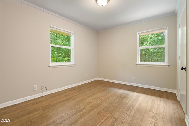 a kitchen with granite countertop cabinets and white appliances