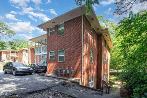 a car parked in front of a house