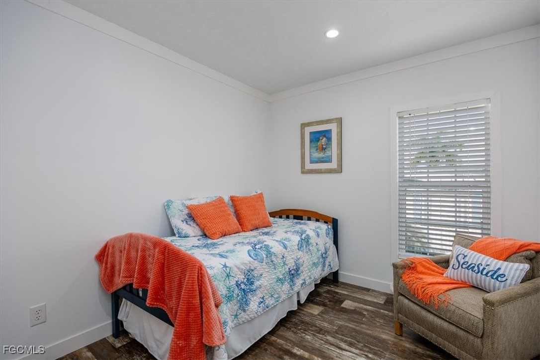 2801 York Road St. James City, FL 33956 - Photo 19 of 31 a bedroom with bed and a window