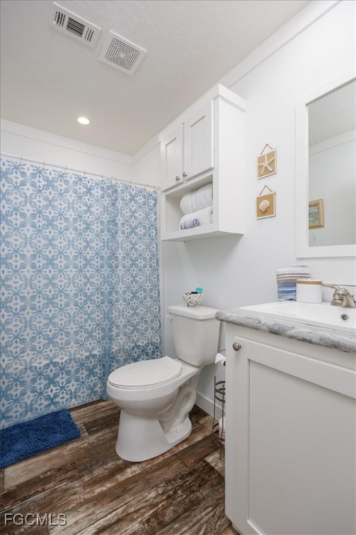 2801 York Road St. James City, FL 33956 - Photo 20 of 31 a bathroom with a granite countertop toilet sink and mirror