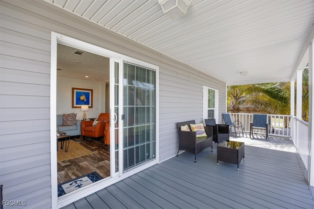 2801 York Road St. James City, FL 33956 - Photo 21 of 31 a view of living room and wooden floor