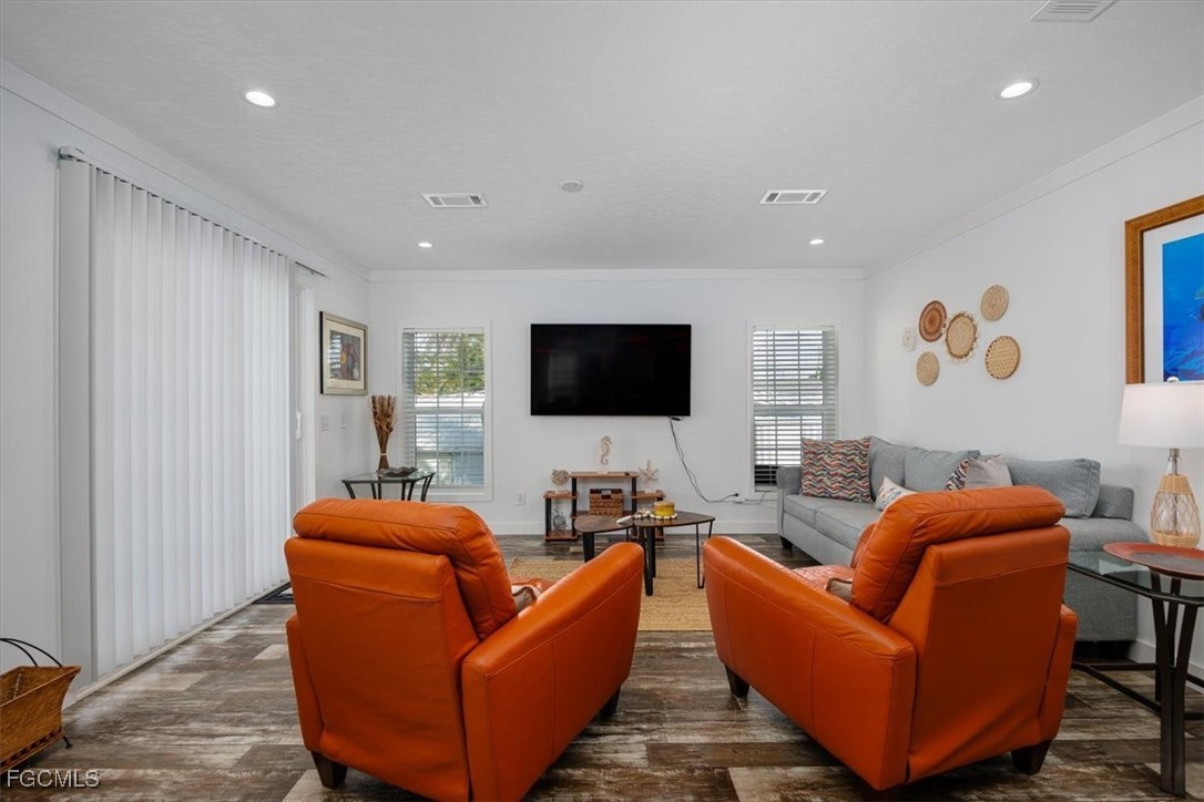 2801 York Road St. James City, FL 33956 - Photo 6 of 31 a living room with furniture and a flat screen tv