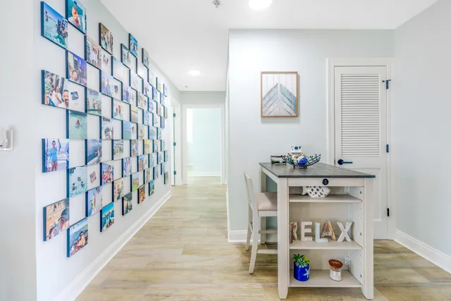 a view of an entryway with wooden floor