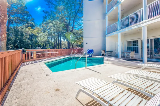 a view of a backyard with a patio