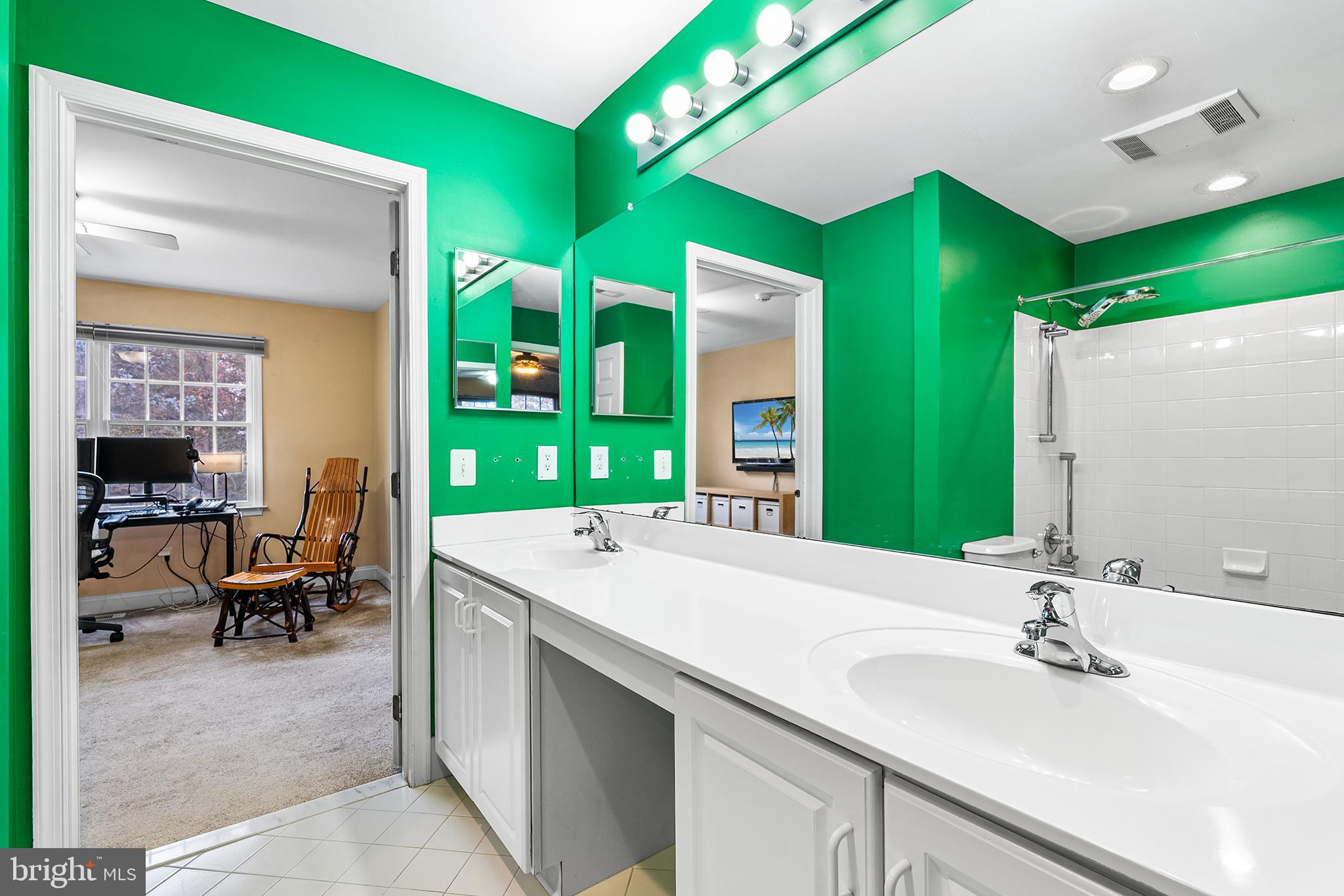 2000 St Andrews Drive Berwyn, PA 19312 - Photo 29 of 44 a bathroom with a sink and a mirror