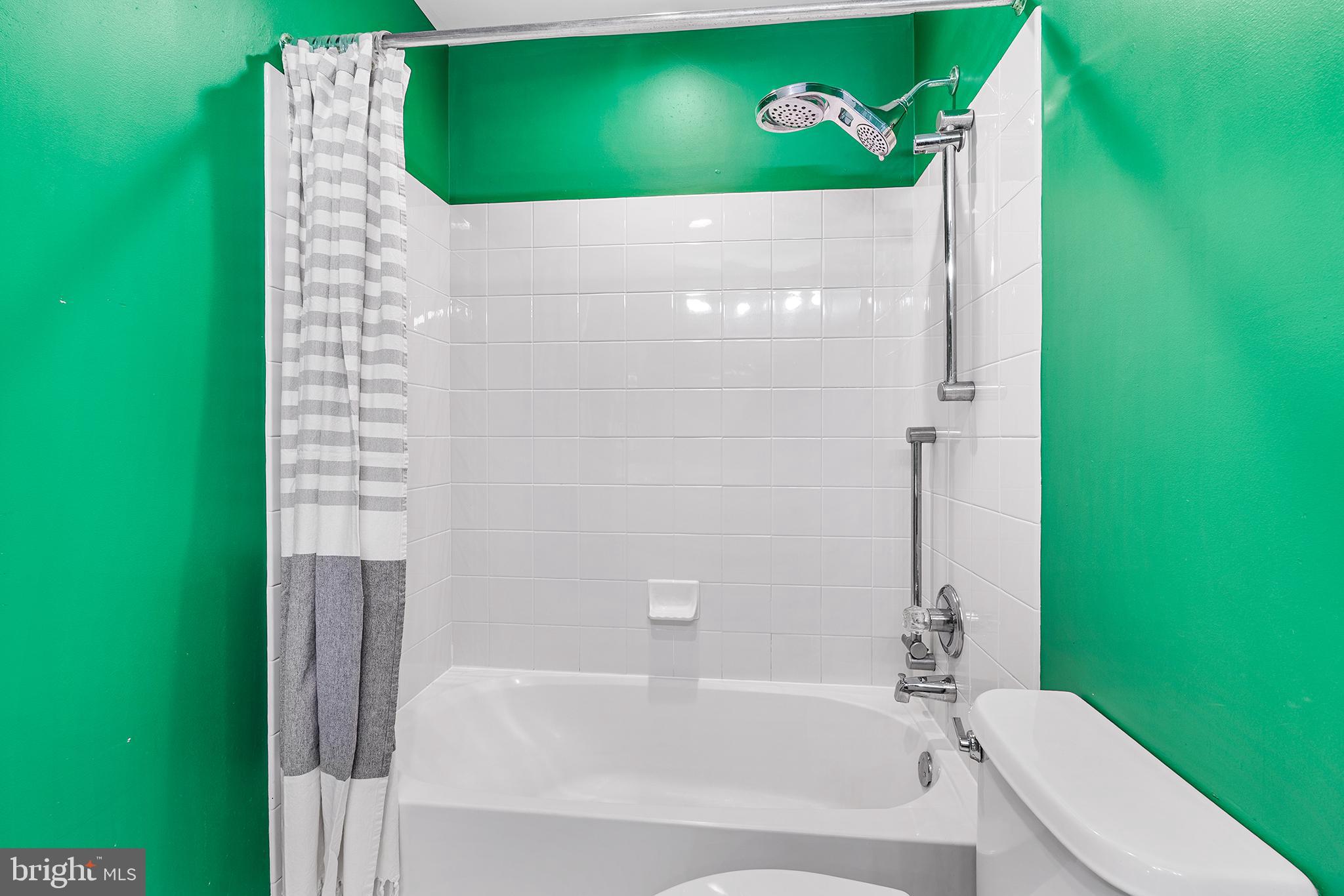 2000 St Andrews Drive Berwyn, PA 19312 - Photo 30 of 44 a bathroom with a bathtub and a toilet