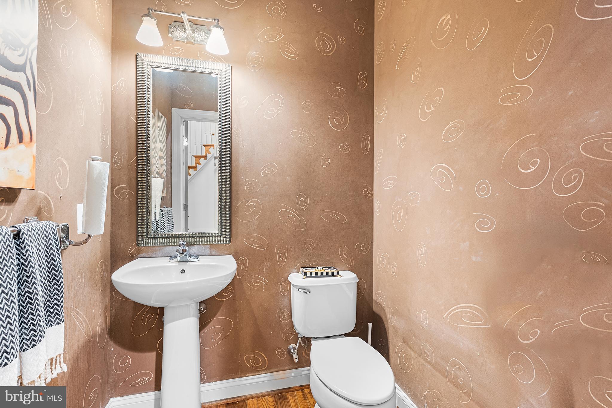 2000 St Andrews Drive Berwyn, PA 19312 - Photo 6 of 44 a bathroom with a toilet sink and mirror