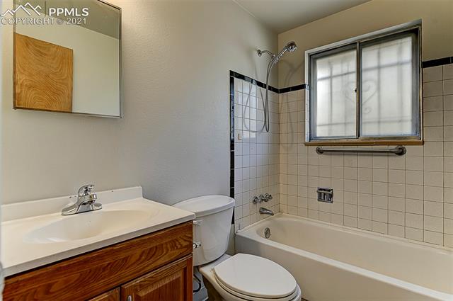 18 North Chelton Road Colorado Springs, CO 80909 - Photo 13 of 32 Main level bath