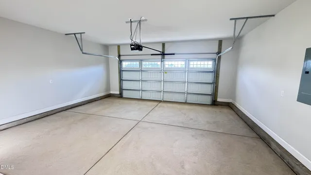 a swimming pool with trees in the background