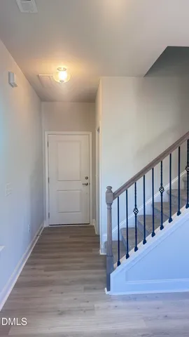 a bathroom with a toilet a sink and shower