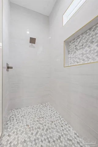 a bathroom with a double vanity sink and mirror