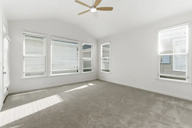 a bathroom with a bathtub and a toilet