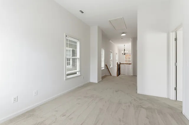 an aerial view of a city with lots of residential buildings