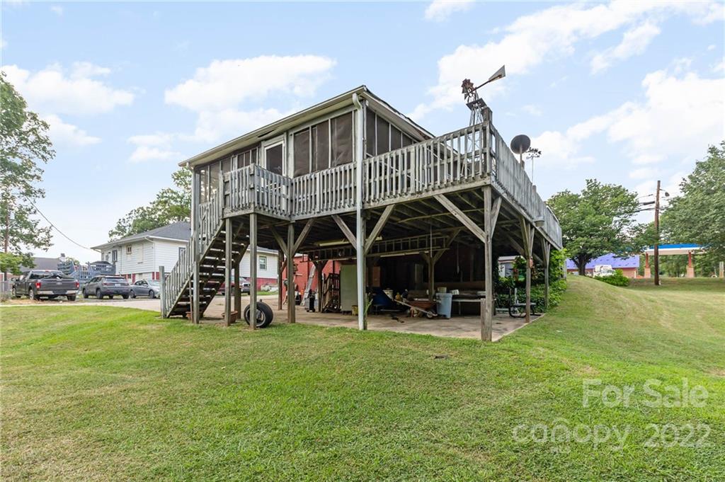 8209 Moores Chapel Road Charlotte, NC 28214 - Photo 28 of 32 a view of a house with backyard and porch