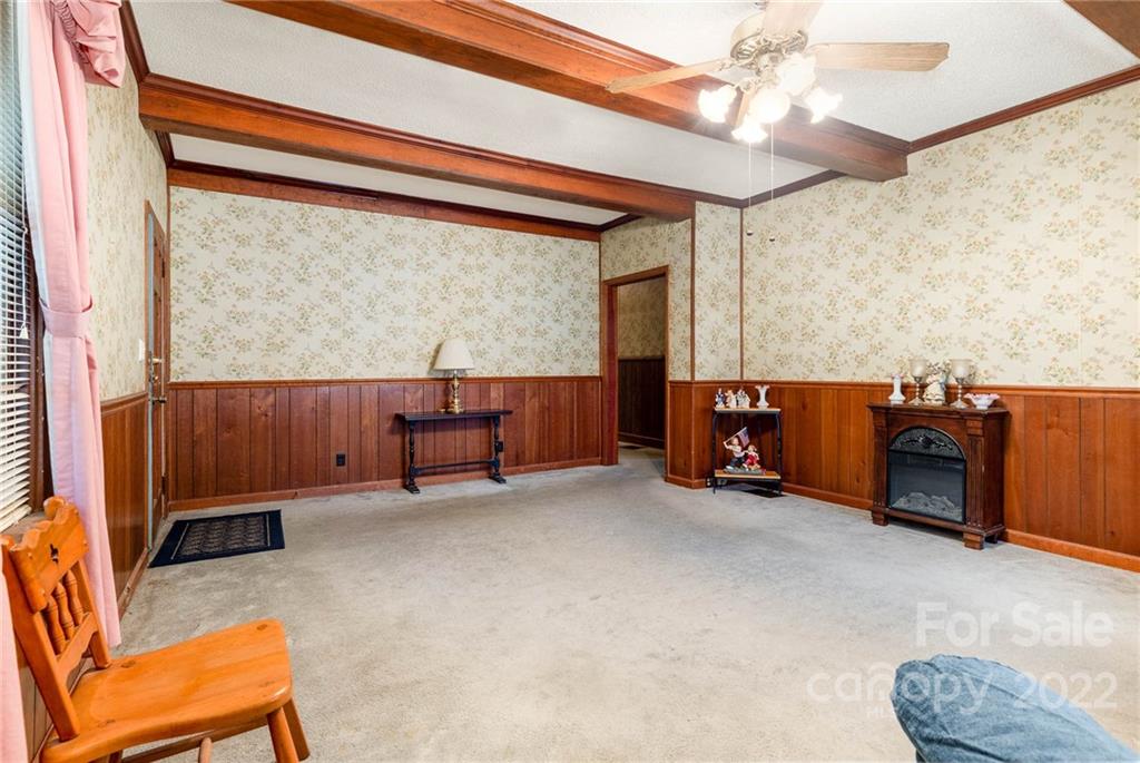 8209 Moores Chapel Road Charlotte, NC 28214 - Photo 8 of 32 a view of workspace with furniture and window