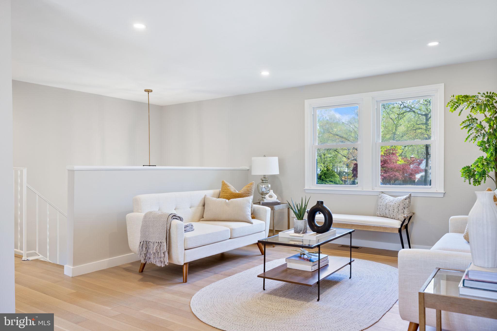 12870 Graypine Place Herndon, VA 20170 - Photo 2 of 35 a living room with furniture and a window