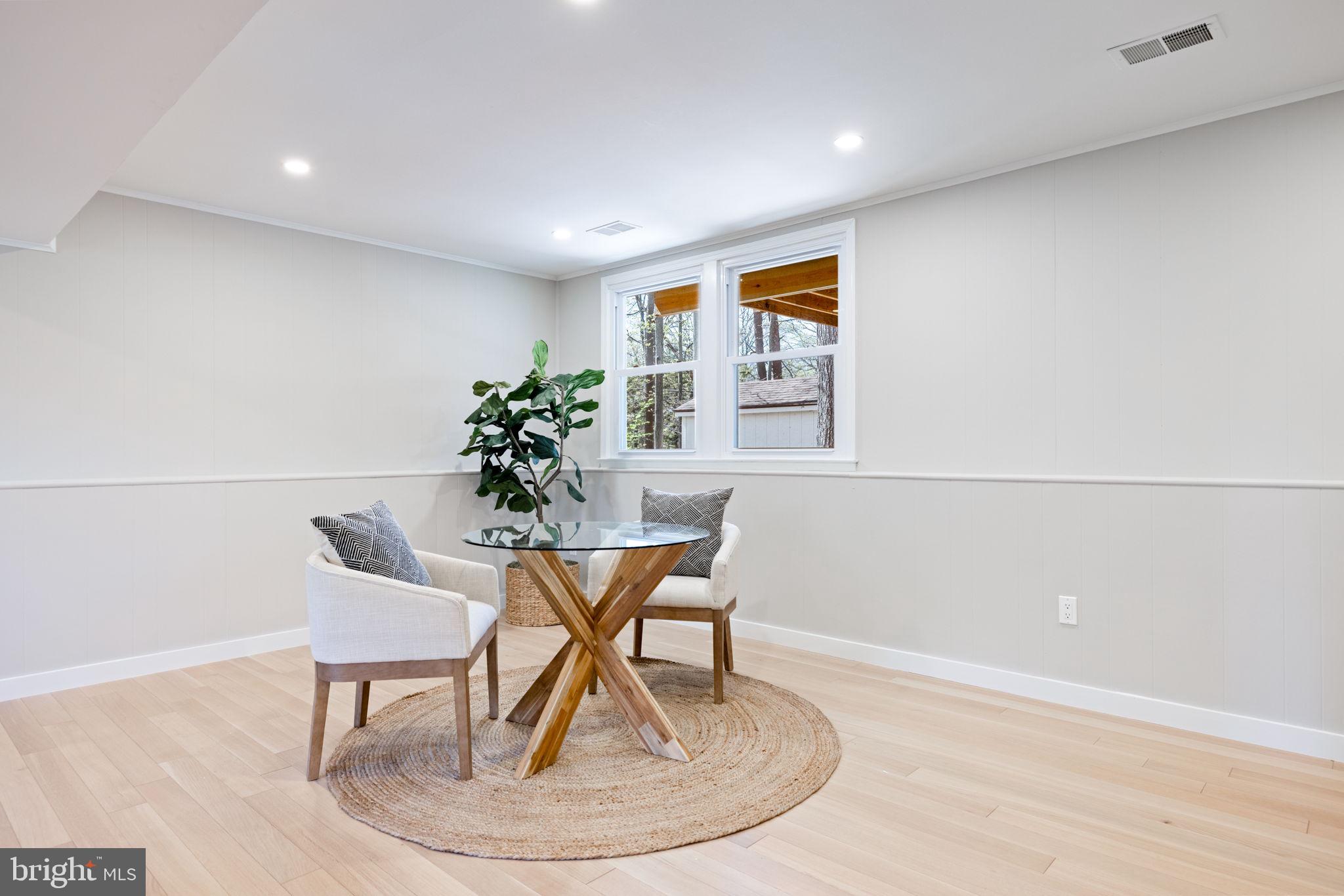 12870 Graypine Place Herndon, VA 20170 - Photo 21 of 35 a workspace with furniture and wooden floor
