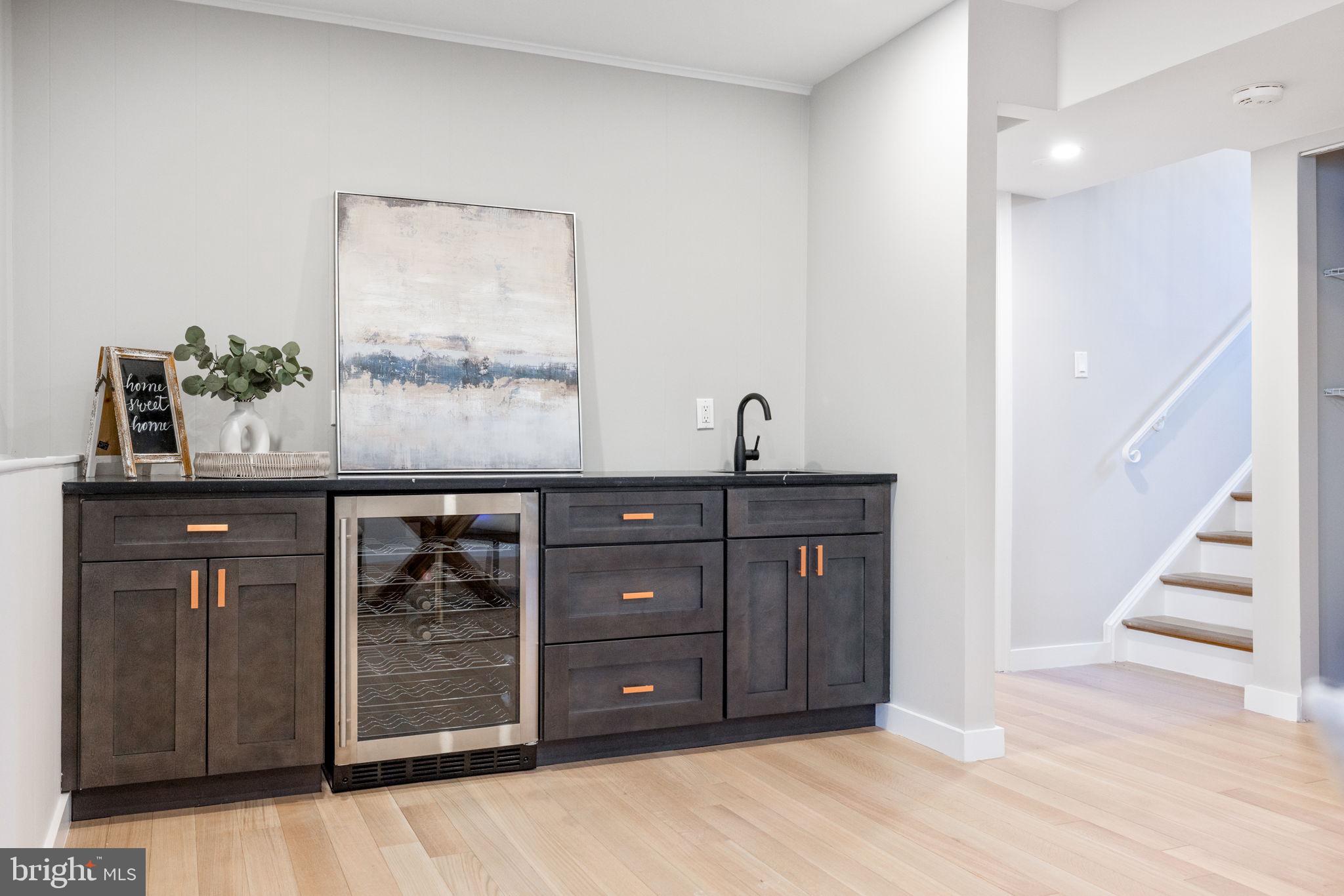 12870 Graypine Place Herndon, VA 20170 - Photo 26 of 35 a room with a dresser and a wooden floor