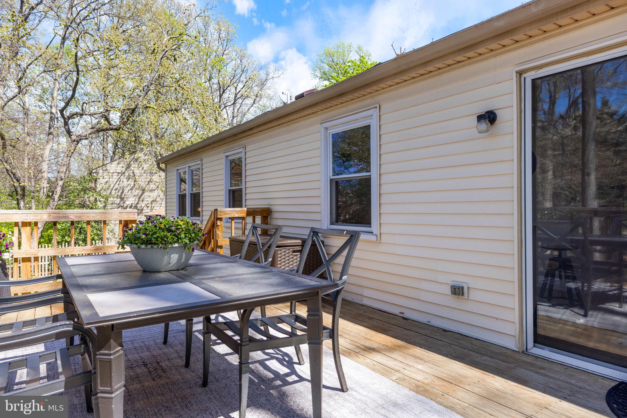 12870 Graypine Place Herndon, VA 20170 - Photo 10 of 35 a view of a outdoor seating area with furniture
