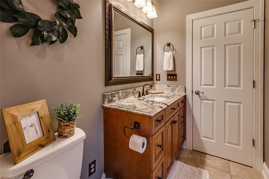 6388 Branson Davis Road Randleman, NC 27317 - Photo 18 of 30 Hall bath, ceramic floor & granite counters