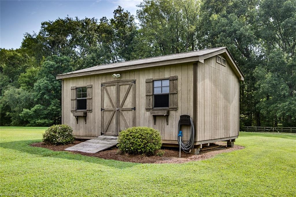 6388 Branson Davis Road Randleman, NC 27317 - Photo 25 of 30 Wired storage building also has water faucet