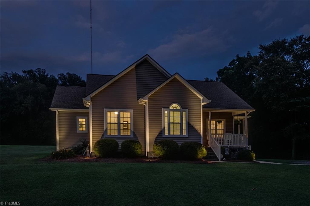 6388 Branson Davis Road Randleman, NC 27317 - Photo 28 of 30 Beautifully lit up front exterior