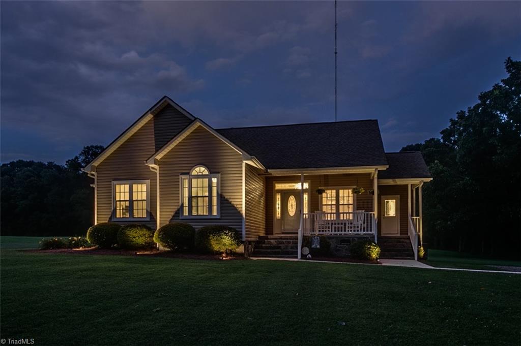 6388 Branson Davis Road Randleman, NC 27317 - Photo 29 of 30 Beautifully lit up front exterior