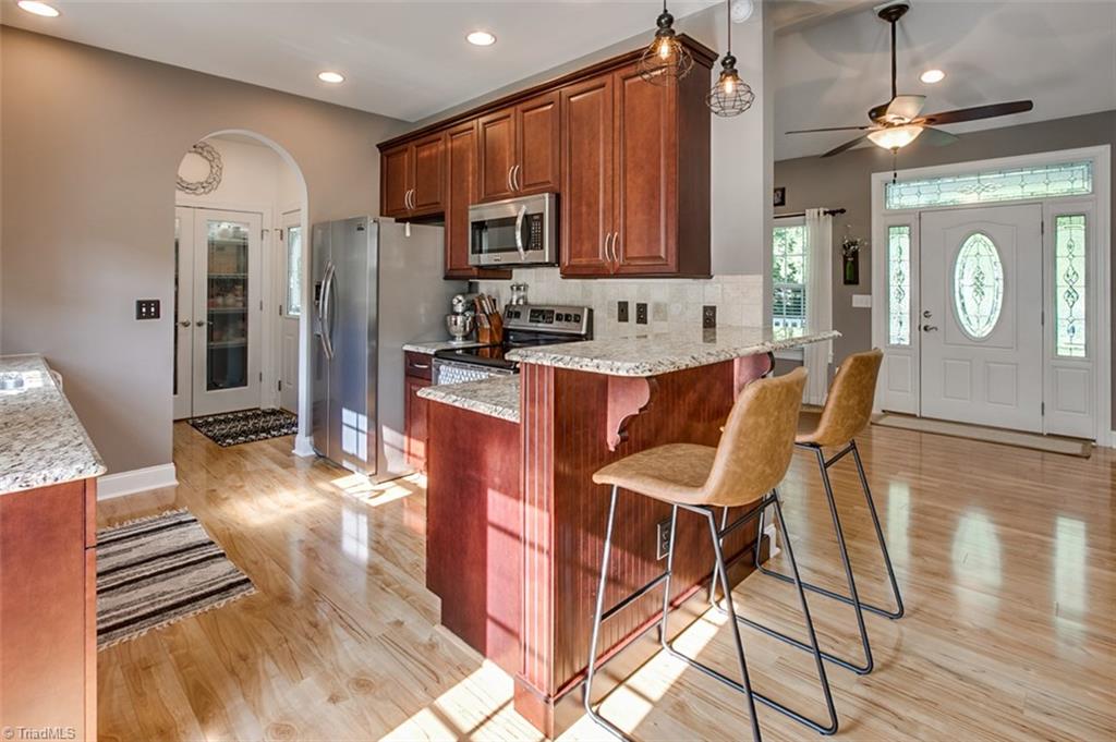 6388 Branson Davis Road Randleman, NC 27317 - Photo 8 of 30 Kitchen with eat-at bar