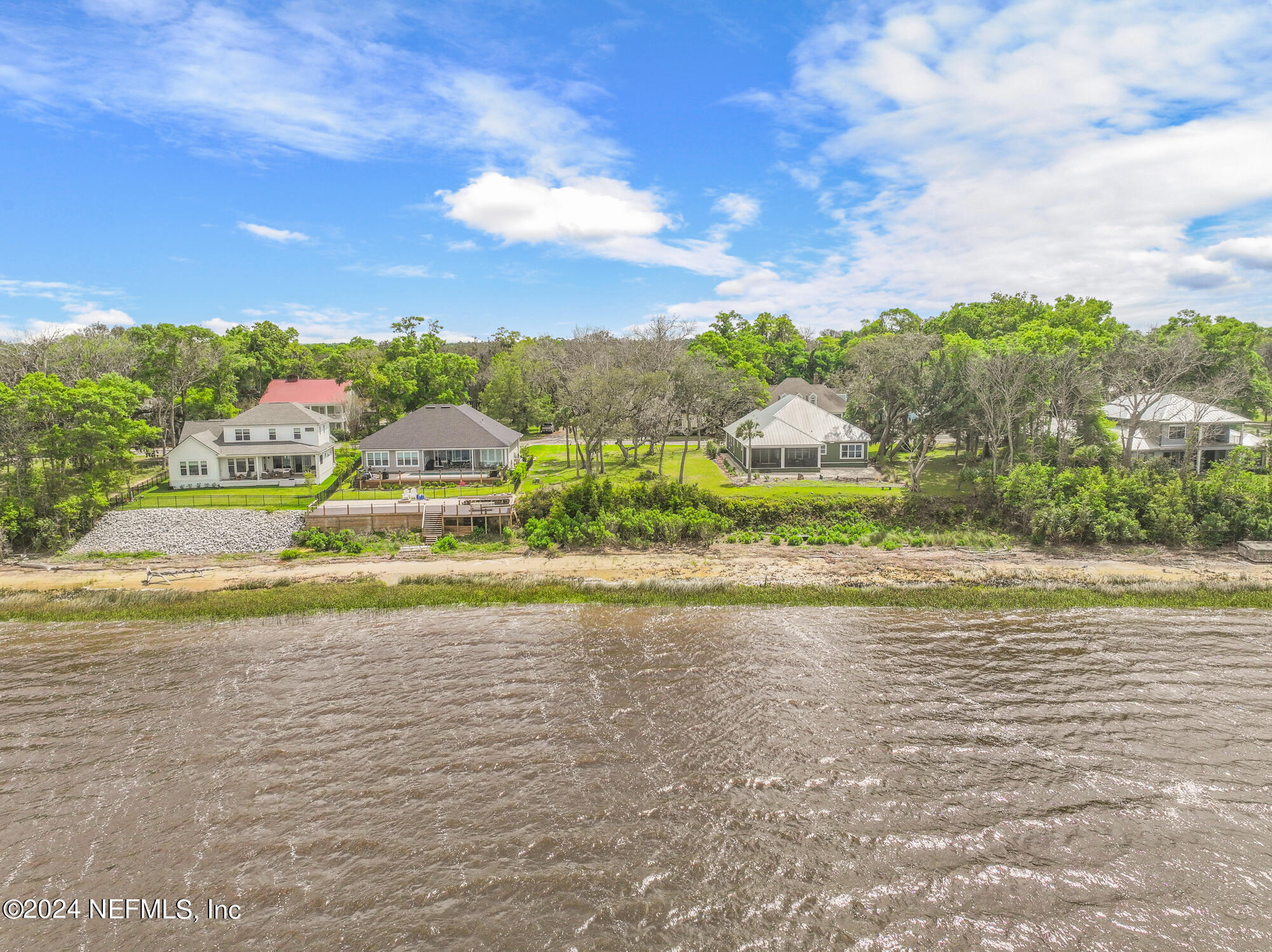 28676 Grandview Manor Yulee, FL 32097 - Photo 14 of 23 a view of a lake with houses in the back